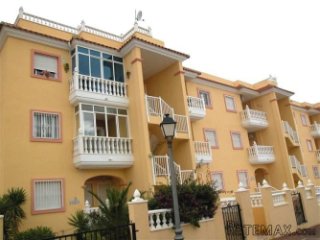This south facing top floor apartment is offered for sale..