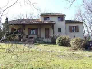 Situated Above A Village With Shops..