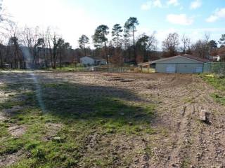 Large plot of land with building..