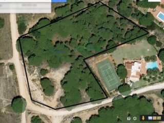 Large building plot with sea views..