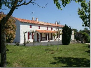 - Large farmhouse with good development.