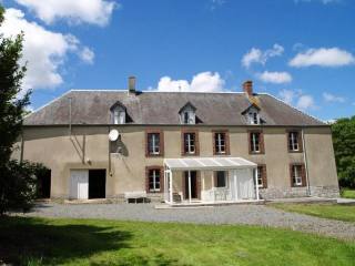Vast Farmhouse with Many Outbuildings