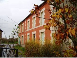 Large House With Many Outbuildings