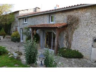 Pretty stone property with pool and gîte