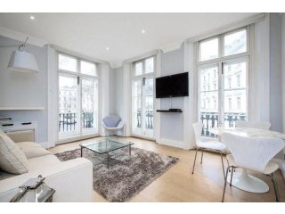 An Attractive First Floor Flat Ideally..