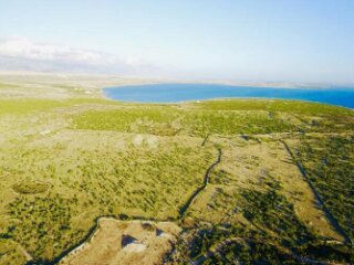 Atraktivna građevna parcela s pogledom na more, turistička n