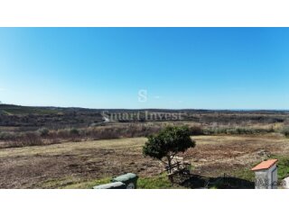 BUJE, građevinsko zemljište od 1302 m2 za kuću, pogled more