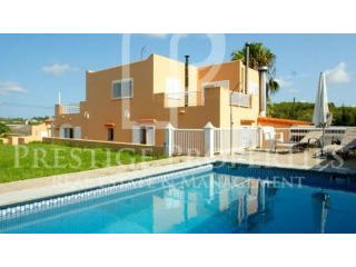 House with swimming-pool in the center..