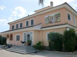 Hotel or Bed and Breakfast with Stables.