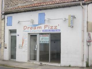 Building with shopl and apartment in..