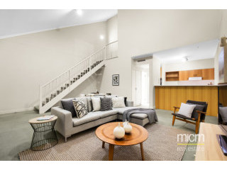 Dual Level Boutique Living in..