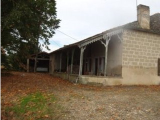 A Large Stone Farmhouse In Need Of..