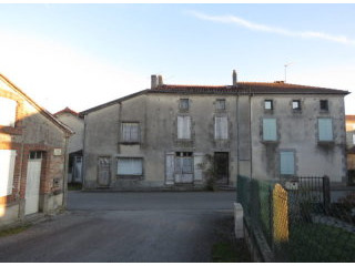 Big house with old butcher shop to..