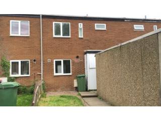A Three Bedroom Mid Terraced House with..