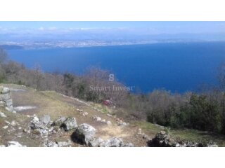 LOVRAN, Građevinsko zemljište od 994 m2 s prekrasnim p..