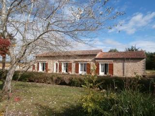 Stone house with attached garage and..