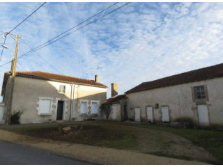 Farmhouse and barn on outskirts of..
