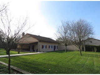 Bungalow with large garden and garages.