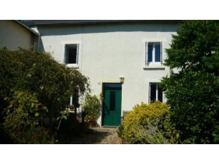 Character stone cottage in village...
