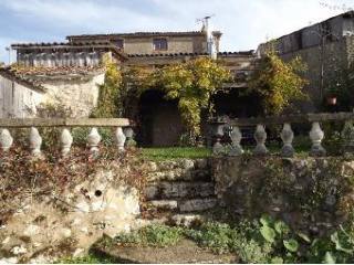 At The Entrance Of The Bastide Town Of..