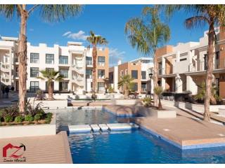 New build Duplex with pool situated in..