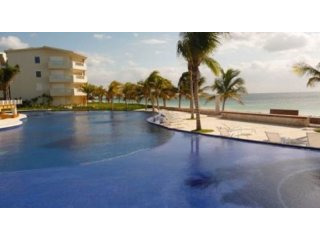 DE LUXE BEACH FRONT CONDOMINIUM FOR..