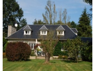 Parkland manor house with Pyrenees..