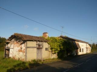 2 bed house with large amount of land..