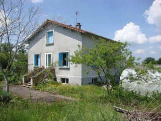Stone House With Garage, An Outbuilding..