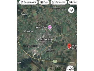 Prostrana parcela sa dva ucrtana objekta, 10153 m²