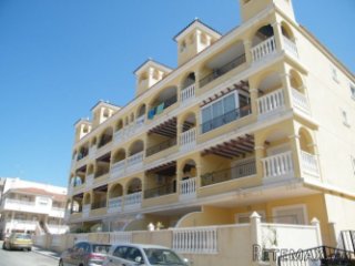 Attractive first floor corner apartment in the popular..