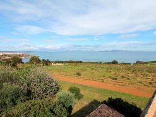 Seafront plot with construction project