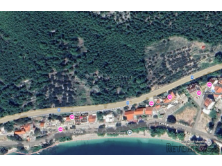 Zemljište uz magistralu s pogledom na more