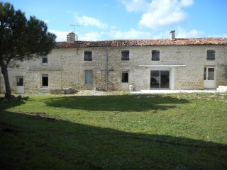 Two Stone Houses With Outbuildings