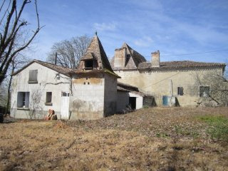 A Set Of Stone Buildings Including The..