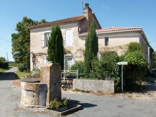 A Pretty Stone House On The Edge Of A..