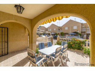 Mediterranean style townhouse located in Punta Prima. The..