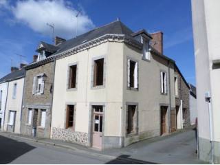 Village House with Enormous Potential