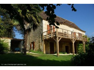 Restored house with outbuildings in..