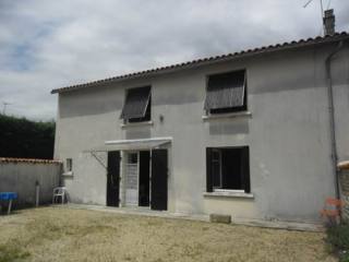 Habitable country property with garden..