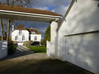Bourgeois House with Enclosed Garage