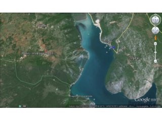 ZEMLJIŠTE S PROJEKTOM ZA VILU - POVOLJNO