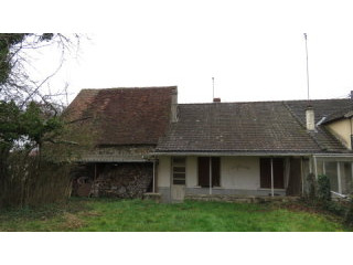 Cottage with attached barn and 5 acres..