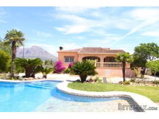 This Villa is located in a quiet area of Javea near the..
