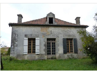 Potential: 4 bedroom house to restore..