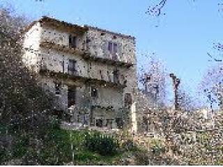 Large detached stone house with..