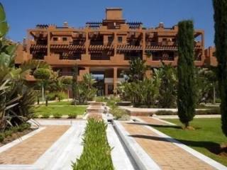 Apartment - This exclusive beachfront..