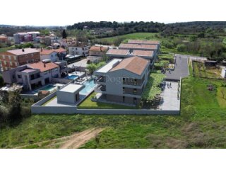 Stan na mirnoj lokaciji - luksuzni resort - novogradnja
