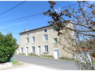 Big house on outskirts of small town -..