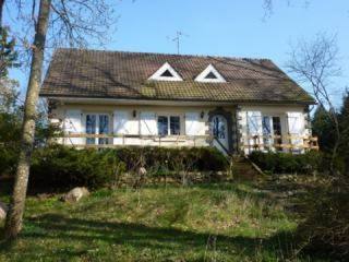 House with Basement on Wooded Grounds